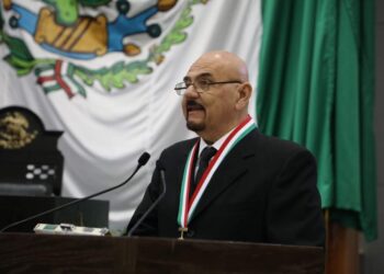 Asado de puerco y cabrito en salsa, sobre las brasas